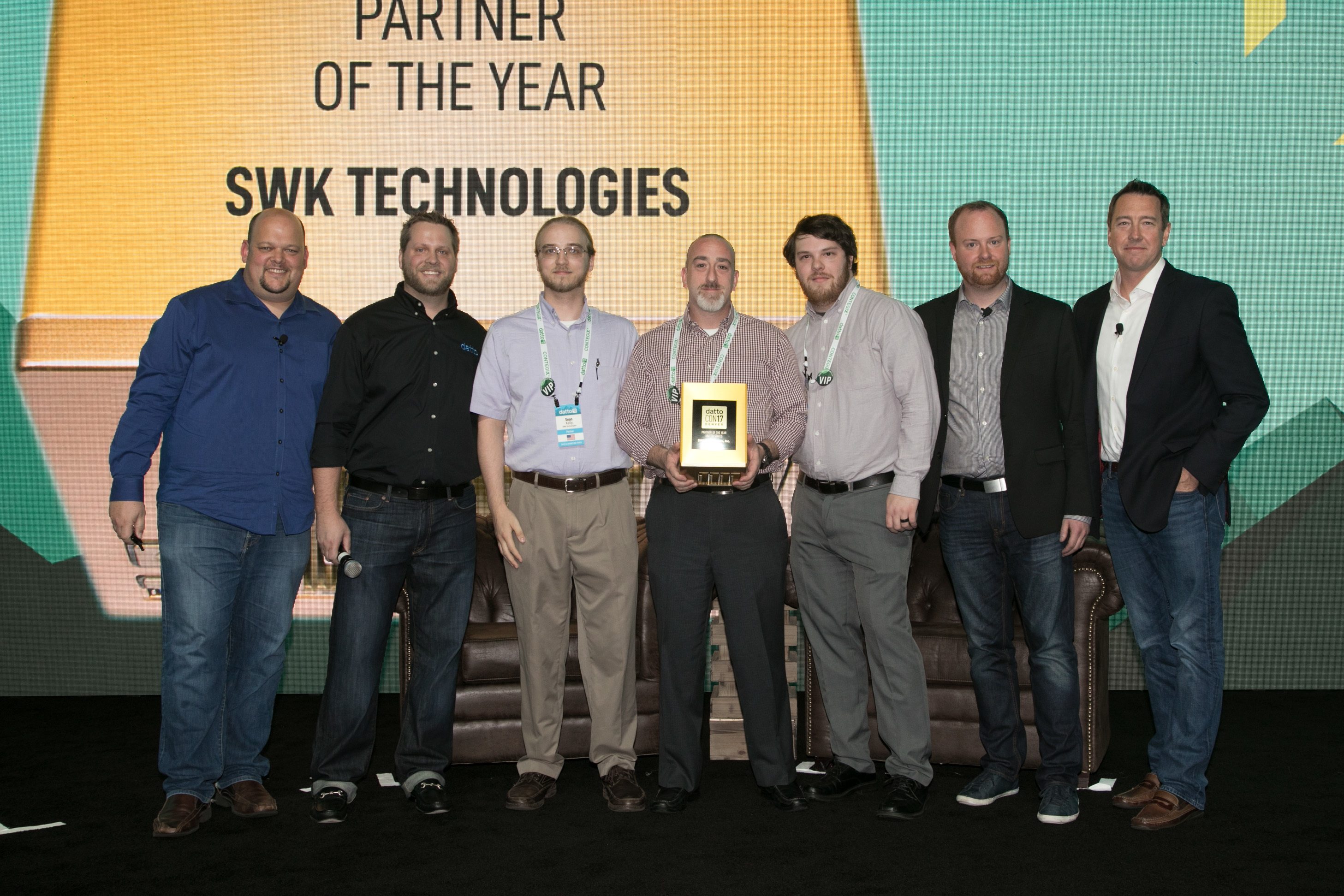 SWK accepting Datto award