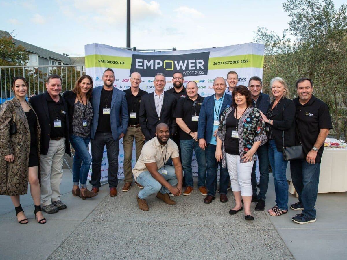 A group of people posing for a photo at an event.