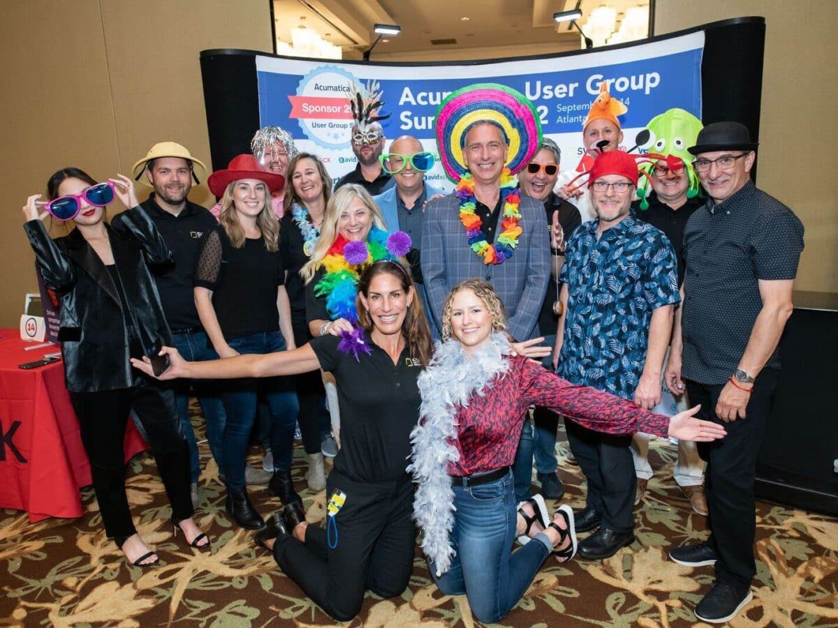 A group of people posing for a photo at an event.