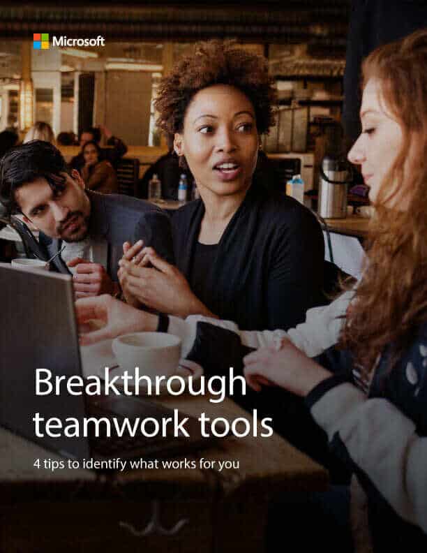 A group of people sitting around a table with the words breakthrough teamwork tools.