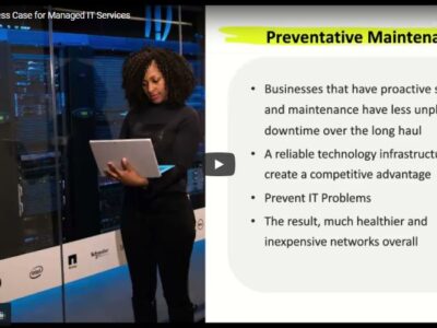 A woman is standing in front of a server with the words preventive maintenance.