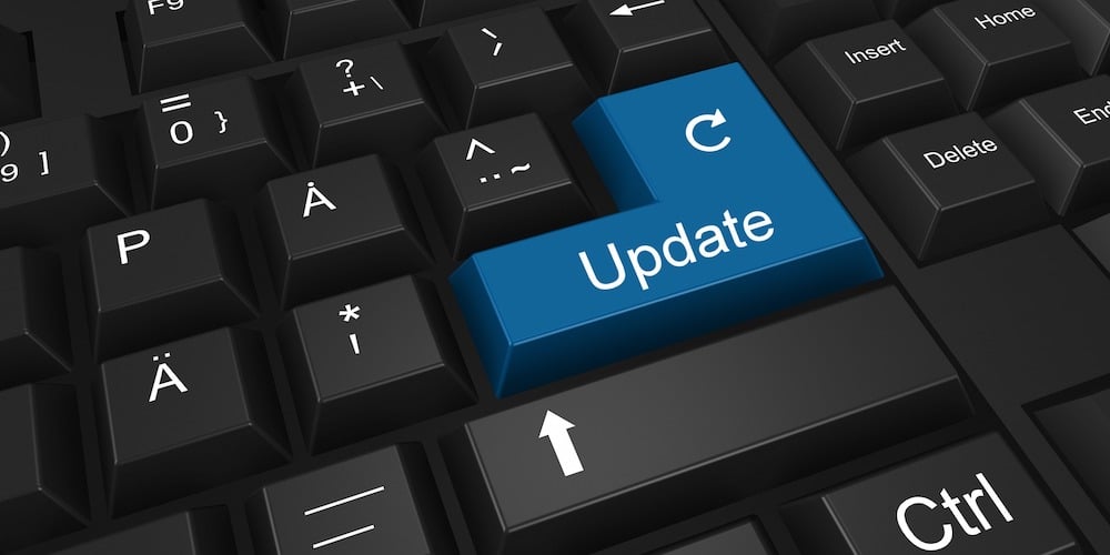 An image of a computer keyboard with an update button on it as the header image for the How to Update Sage 100 Licenses After Changing Your User Count or Modifying Modules blog from SWK Technologies, the ERP consultants