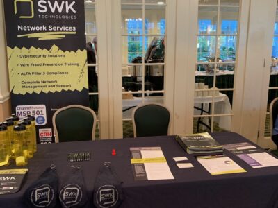 SWK technologies booth at a conference.
