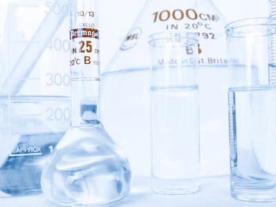 A group of test tubes and flasks on a white background.