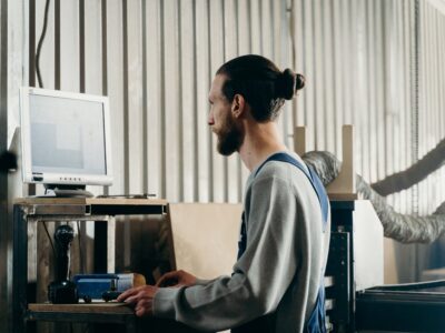 A man working on a machine in a factory.