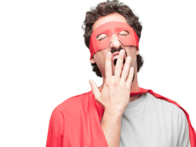 A man with a red superhero mask covering his face.