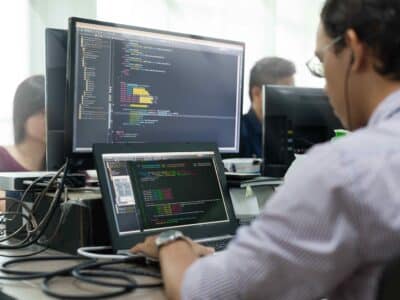 A group of people working on computers.