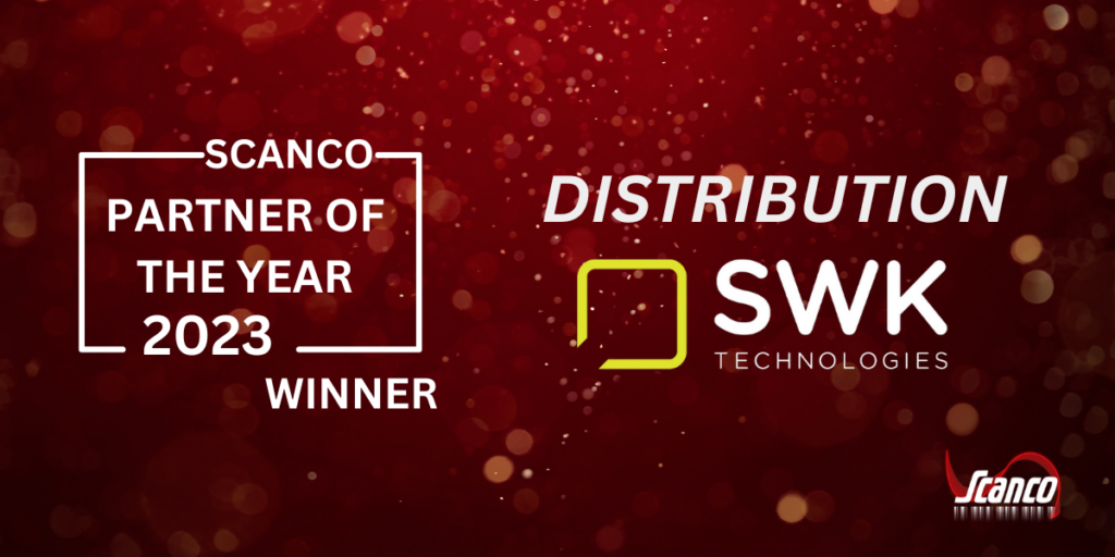 White lettering saying Scanco Partner of the Year 2023 Winner in Distribution is SWK Technologies