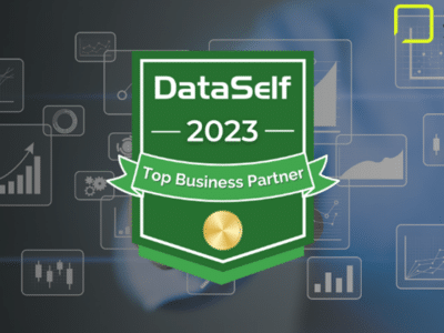 The badge for the DataSelf Top Business Partner for 2023 centered against a black-to-blue background with the SWK Technologies logo in the upper right hand corner