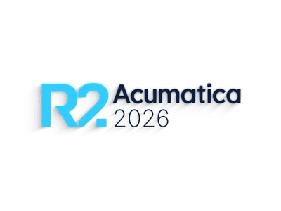 Acumatica 2026 R2 release logo featuring a large bold light blue "R2" with a soft shadow, next to the Acumatica brand name in dark navy type and "2026" in thin dark navy type below it, on a white background.